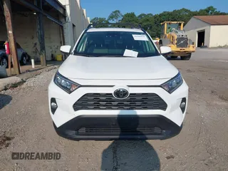 2019 Toyota RAV4 XLE with VIN JTMP1RFV0KD020442, listed as a IAAI auction lot 40108049 with 70,916 mi miles and . Bid and sale history available at DreamBid. Image 12.