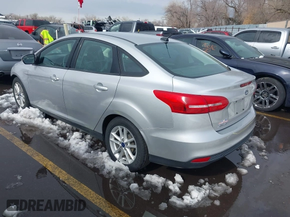 2016 Ford Focus SE with VIN 1FADP3F21GL325603, listed as a IAAI auction lot 41562523 with 97,749 mi miles. Bid and sale history available at carsss.com. Image 3.