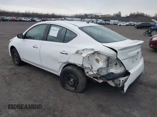 2016 Nissan Versa SV with VIN 3N1CN7AP1GL887921, listed as a IAAI auction lot 42002167 with 65,470 mi miles. Bid and sale history available at carsss.com. Image 3.
