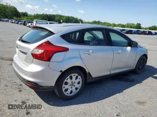 2012 Ford Focus SE z VIN 1FAHP3K20CL219046, wystawiony jako Copart lot #58771285 z przebiegiem 167 703 mil mil oraz Szkoda całkowita • Salvage title. Historia ofert i sprzedaży dostępna na DreamBid. Obrazek 3.