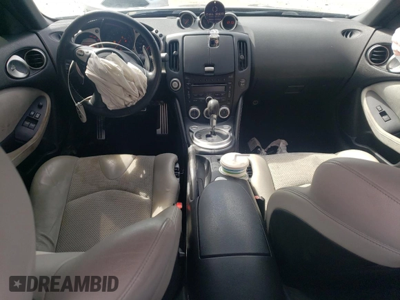 2010 Nissan 370Z Touring with VIN JN1AZ4EH8AM501134, listed as a Copart auction lot 73919614 with 106,599 mi miles and Salvage Title. Bid and sale history available at carsss.com. Image 8.