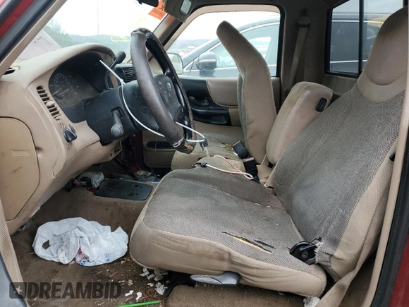 2001 Ford Ranger XL with VIN 1FTYR10C91TA26959, listed as a Copart auction lot 86453044 with 303,676 mi miles and Salvage title. Bid and sale history available at DreamBid. Image 7.