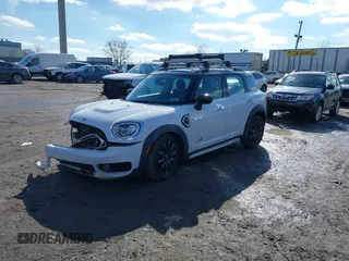 2020 MINI Countryman Cooper S z VIN WMZYX1C06L3M01166, wystawiony jako IAAI lot #41540885 z przebiegiem 37 008 mil mil oraz . Historia ofert i sprzedaży dostępna na DreamBid. Obrazek 16.