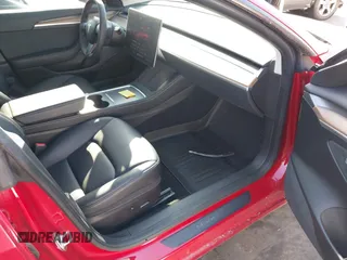 2022 Tesla Model 3 Long Range with VIN 5YJ3E1EB3NF273540, listed as a IAAI auction lot 41978069 with 27,247 mi miles and . Bid and sale history available at DreamBid. Image 5.
