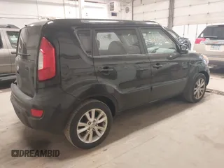 2012 Kia Soul + with VIN KNDJT2A60C7457882, listed as a IAAI auction lot 42050050 with 153,560 mi miles. Bid and sale history available at carsss.com. Image 4.