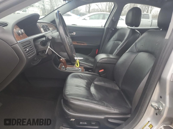 2005 Buick LaCrosse CXL z VIN 2G4WD562151245885, wystawiony jako Copart lot #52332245 z przebiegiem 128 528 mil mil oraz Nie do naprawy. Historia ofert i sprzedaży dostępna na DreamBid. Obrazek 7.