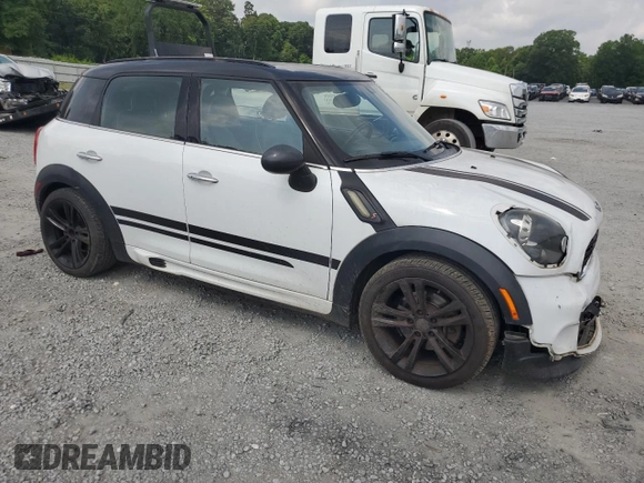 2014 MINI Countryman S with VIN WMWZC3C53EWP27156, listed as a Copart auction lot 59579765 with 159,308 mi miles and Salvage title. Bid and sale history available at DreamBid. Image 4.
