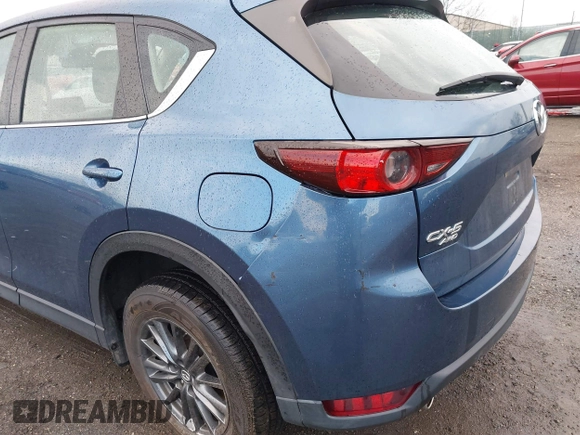 2019 Mazda CX-5 Sport with VIN JM3KFBBM5K0668678, listed as a IAAI auction lot 41811146 with 102,634 mi miles and . Bid and sale history available at DreamBid. Image 17.