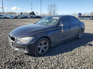 2013 BMW 3 Series 328i xDrive with VIN WBA3B3G58DNP38418, listed as a Copart auction lot 48253075 with 123,768 mi miles and Salvage title. Bid and sale history available at DreamBid. Image 1.