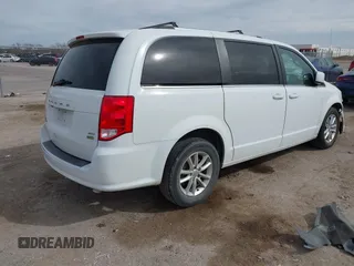 2018 Dodge Grand Caravan SXT with VIN 2C4RDGCG2JR283490, listed as a IAAI auction lot 41796929 with 157,836 mi miles and . Bid and sale history available at DreamBid. Image 4.