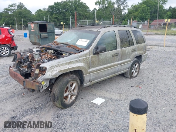 2000 Jeep Grand Cherokee Laredo z VIN 1J4G248N2YC334566, wystawiony jako IAAI lot #42623519 z przebiegiem Nie podano mil oraz . Historia ofert i sprzedaży dostępna na DreamBid. Obrazek 2.