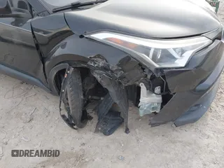 2018 Toyota C-HR XLE with VIN NMTKHMBX9JR001731, listed as a IAAI auction lot 41835918 with 138,087 mi miles. Bid and sale history available at carsss.com. Image 6.