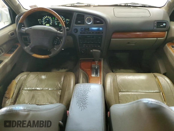 2001 Infiniti QX4 Luxury z VIN JNRDR09Y81W219674, wystawiony jako Copart lot #74221844 z przebiegiem 167 787 mil mil oraz Szkody całkowita. Historia ofert i sprzedaży dostępna na DreamBid. Obrazek 8.