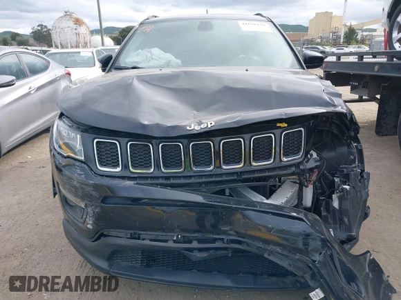 2018 Jeep Compass Altitude with VIN 3C4NJDBB0JT484409, listed as a IAAI auction lot 41656179 with 85,436 mi miles and . Bid and sale history available at carsss.com. Image 12.