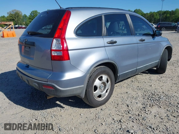 2009 Honda CR-V LX with VIN JHLRE48379C011817, listed as a IAAI auction lot 42059815 with 217,661 mi miles. Bid and sale history available at carsss.com. Image 4.