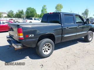 2006 GMC Sierra 1500 SLT with VIN 2GTEK13T261243348, listed as a IAAI auction lot 42210751 with 241,547 mi miles and . Bid and sale history available at carsss.com. Image 4.