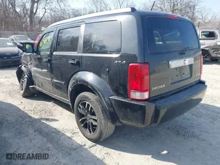 2010 Dodge Nitro SXT with VIN 1D4PU5GK0AW134368, listed as a IAAI auction lot 41786095 with 117,563 mi miles. Bid and sale history available at carsss.com. Image 3.