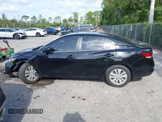2023 Nissan Sentra S z VIN 3N1AB8BV7PY287992, wystawiony jako IAAI lot #42335056 z przebiegiem 14 482 mil mil oraz . Historia ofert i sprzedaży dostępna na DreamBid. Obrazek 14.
