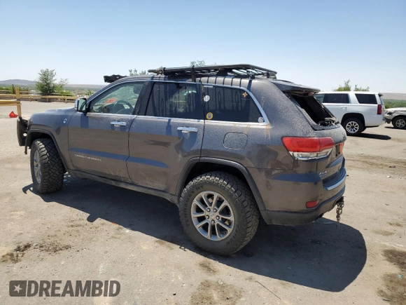 2014 Jeep Grand Cherokee Limited with VIN 1C4RJFBM3EC384398, listed as a Copart auction lot 57703835 with 153,255 mi miles and Salvage title. Bid and sale history available at DreamBid. Image 2.