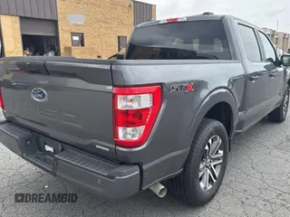 2023 Ford F-150 XL with VIN 1FTEW1CP4PKF54711, listed as a Copart auction lot 64622945 with 3,801 mi miles and Clean title. Bid and sale history available at DreamBid. Image 4.