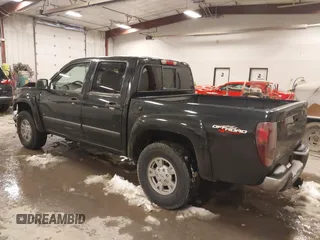 2008 GMC Canyon SLE2 with VIN 1GTDT43E988228132, listed as a IAAI auction lot 41405379 with 130,355 mi miles. Bid and sale history available at carsss.com. Image 3.