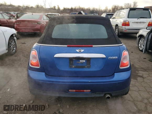 2014 MINI Convertible with VIN WMWZN3C53ET861225, listed as a Copart auction lot 87791665 with 104,151 mi miles and Salvage title. Bid and sale history available at DreamBid. Image 6.