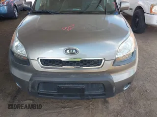 2010 Kia Soul + with VIN KNDJT2A28A7163141, listed as a IAAI auction lot 42035132 with 211,661 mi miles. Bid and sale history available at carsss.com. Image 6.