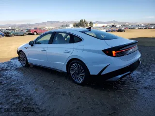 2024 Hyundai Sonata Hybrid SEL with VIN KMHL34JJ0RA097450, listed as a Copart auction lot 83881974 with 9,686 mi miles and Clean Title. Bid and sale history available at carsss.com. Image 2.