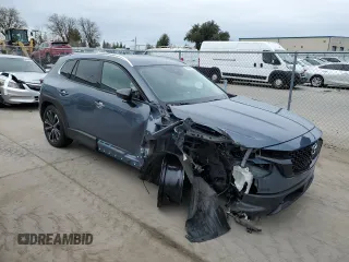 2023 Mazda CX-50 S Premium Plus with VIN 7MMVABEM7PN101642, listed as a Copart auction lot 47498675 with 12,299 mi miles and Salvage Title. Bid and sale history available at DreamBid. Image 4.