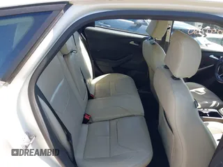 2018 Ford Focus Titanium with VIN 1FADP3N24JL279449, listed as a IAAI auction lot 42297780 with 144,479 mi miles and . Bid and sale history available at DreamBid. Image 8.