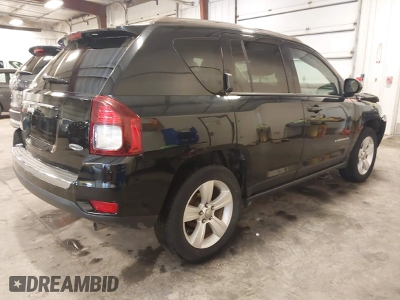 2015 Jeep Compass Latitude with VIN 1C4NJDEBXFD304409, listed as a IAAI auction lot 41629121 with 123,486 mi miles. Bid and sale history available at carsss.com. Image 4.