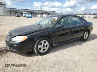 2000 Ford Taurus SE with VIN 1FAFP53U9YG285971, listed as a Copart auction lot 78138984 with 182,135 mi miles and Salvage Title. Bid and sale history available at DreamBid. Image 1.