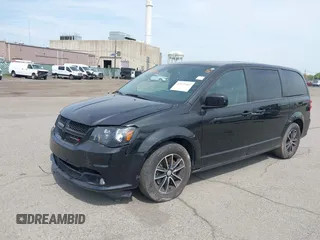 2019 Dodge Grand Caravan GT with VIN 2C4RDGEG5KR614223, listed as a IAAI auction lot 42172107 with 130,897 mi miles and . Bid and sale history available at DreamBid. Image 2.