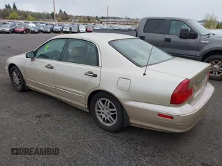 2000 Mitsubishi Diamante LS z VIN 6MMAP67P7YT005234, wystawiony jako IAAI lot #41896098 z przebiegiem 131 852 mil mil oraz . Historia ofert i sprzedaży dostępna na DreamBid. Obrazek 3.