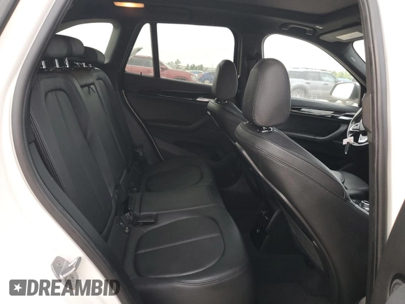 2017 BMW X1 sDrive28i with VIN WBXHU7C37H5H34418, listed as a Copart auction lot 53073995 with 67,980 mi miles and Salvage Title. Bid and sale history available at carsss.com. Image 11.