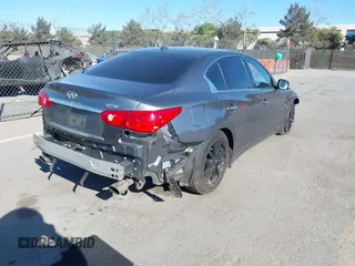 2017 Infiniti Q50 Premium with VIN JN1EV7AP3HM742461, listed as a IAAI auction lot 41307826 with 82,486 mi miles and . Bid and sale history available at DreamBid. Image 4.