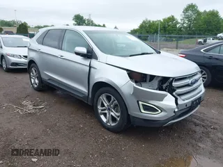 2015 Ford Edge Titanium z VIN 2FMTK4K9XFBB48413, wystawiony jako IAAI lot #42348251 z przebiegiem 168 792 mil mil oraz . Historia ofert i sprzedaży dostępna na DreamBid. Obrazek 1.