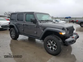 2023 Jeep Wrangler Rubicon with VIN 1C4HJXFN6PW509741, listed as a Copart auction lot 46056775 with 21,755 mi miles and Salvage title. Bid and sale history available at DreamBid. Image 4.