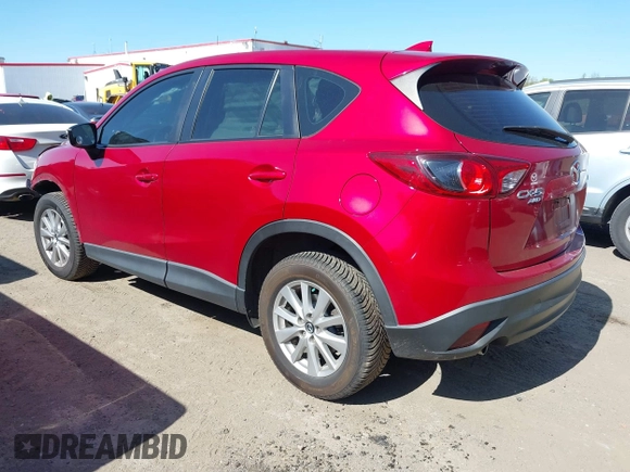 2016 Mazda CX-5 Sport with VIN JM3KE4BY7G0805631, listed as a IAAI auction lot 42028606 with 93,659 mi miles and . Bid and sale history available at carsss.com. Image 3.