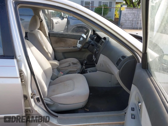 2007 Kia Spectra EX z VIN KNAFE121875390282, wystawiony jako IAAI lot #42258052 z przebiegiem 97 869 mil mil oraz . Historia ofert i sprzedaży dostępna na DreamBid. Obrazek 5.