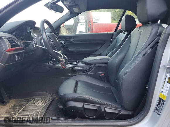 2016 BMW 2 Series 228i with VIN WBA1K9C52GV321963, listed as a Copart auction lot 71393424 with 118,029 mi miles and Salvage Title. Bid and sale history available at carsss.com. Image 7.