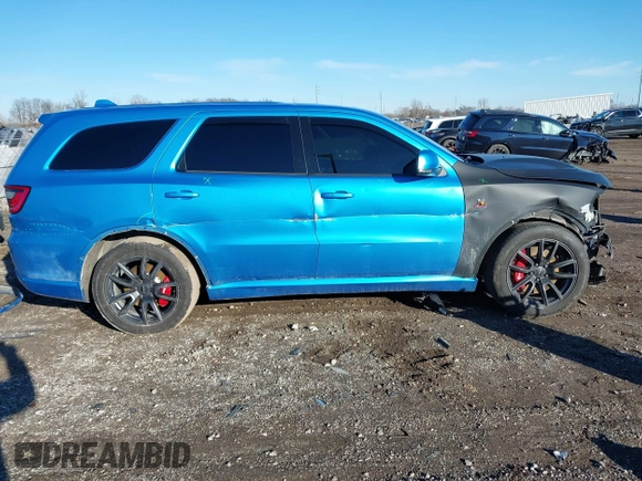 2018 Dodge Durango SRT z VIN 1C4SDJGJ1JC415720, wystawiony jako IAAI lot #41193674 z przebiegiem 63 140 mil mil oraz . Historia ofert i sprzedaży dostępna na DreamBid. Obrazek 14.
