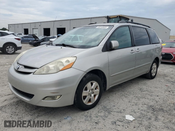 2012 Toyota Sienna XLE AAS with VIN 5TDYK3DC6CS275537, listed as a Copart auction lot 66040605 with 135,148 mi miles and Clean title. Bid and sale history available at DreamBid. Image 1.