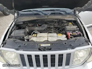 2011 Jeep Liberty Sport with VIN 1J4PN2GK0BW521975, listed as a Copart auction lot 52763735 with 182,058 mi miles and Salvage Title. Bid and sale history available at carsss.com. Image 12.