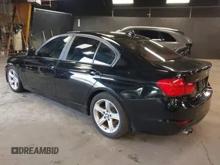 2014 BMW 3 Series 328i xDrive with VIN WBA3B3G50ENR83599, listed as a IAAI auction lot 42106340 with 195,309 mi miles. Bid and sale history available at carsss.com. Image 3.