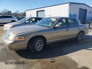 2001 Ford Crown Victoria LX z VIN 2FAFP74W81X121154, wystawiony jako Copart lot #87441264 z przebiegiem 168 061 mil mil oraz Szkoda całkowita • Salvage title. Historia ofert i sprzedaży dostępna na DreamBid. Obrazek 1.