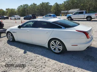 2016 Jaguar XJ Portfolio with VIN SAJWA2G79G8W00955, listed as a Copart auction lot 77650194 with 60,515 mi miles and Clean title. Bid and sale history available at DreamBid. Image 2.