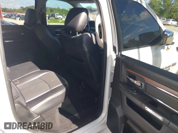 2018 Ram 1500 Laramie with VIN 1C6RR6VT1JS250301, listed as a IAAI auction lot 42736798 with 93,532 mi miles and . Bid and sale history available at DreamBid. Image 8.