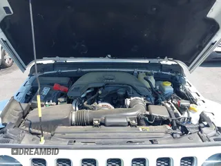 2018 Jeep Wrangler Unlimited Sahara with VIN 1C4HJXEG6JW112976, listed as a IAAI auction lot 42559123 with 76,066 mi miles and . Bid and sale history available at DreamBid. Image 10.