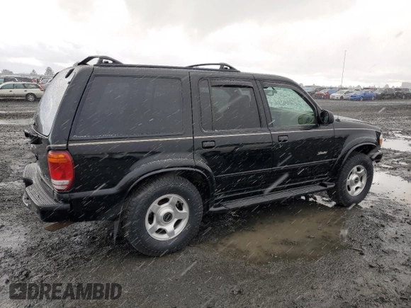 2000 Ford Explorer Limited with VIN 1FMDU75EXYZA76329, listed as a Copart auction lot 80952474 with 90,637 mi miles and Salvage title. Bid and sale history available at DreamBid. Image 3.